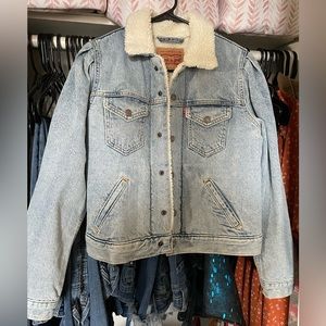 Levi Jean Jacket, size XS but fits more like a small/medium. Never worn
